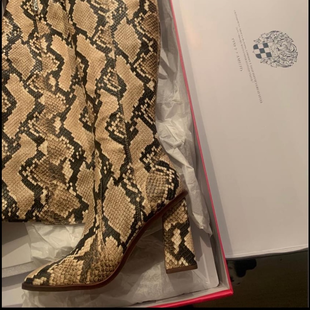 Over the knee snake skin boot